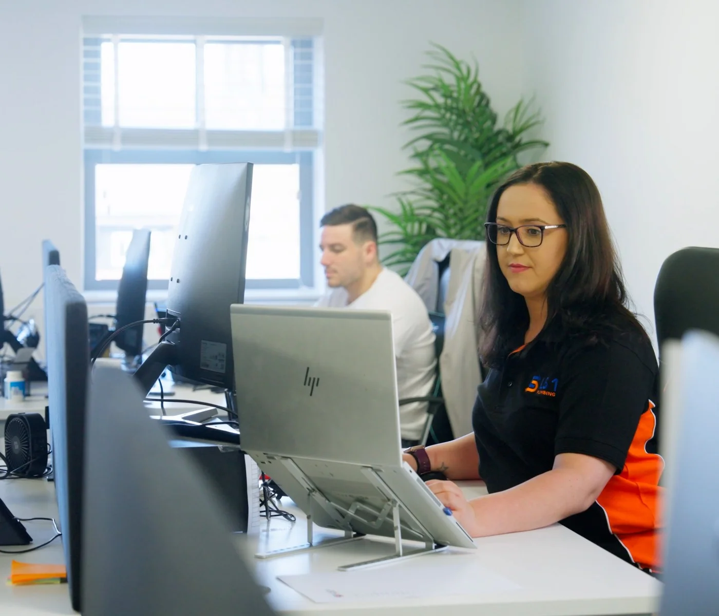 LS1 Plumbing's Customer Care Team Responding To Enquiries And Scheduling Our Plumbers